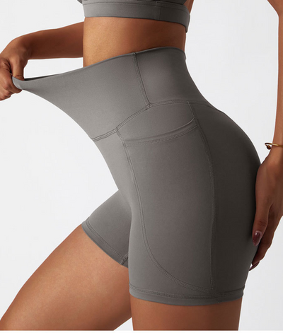 Shorts sportivi a vita alta con tasca